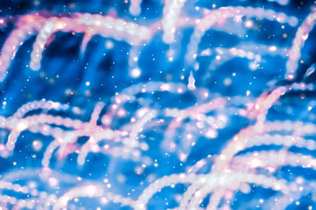 Christmas lights, New Years Eve fireworks and abstract texture concept - Magic sparkling shiny...