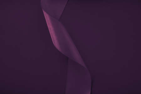 Branding, holidays and luxe brands concept - Abstract curly silk ribbon on purple background,...