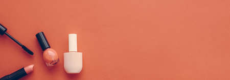 Cosmetic branding, fashion blog cover and girly glamour concept - Make-up and cosmetics product set for beauty brand Christmas sale promotion, vintage orange flatlay background as holiday designの写真素材