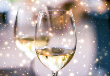 Winery, fine dining drink and luxury New Years Eve celebration concept - Winter holiday glasses of...