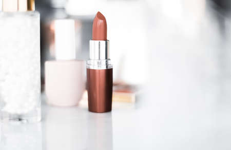 Cosmetic branding, girly and glamour concept - Cosmetics, makeup products on dressing vanity table, lipstick, foundation base, nailpolish and eyeshadows for luxury beauty and fashion brand ads designの写真素材