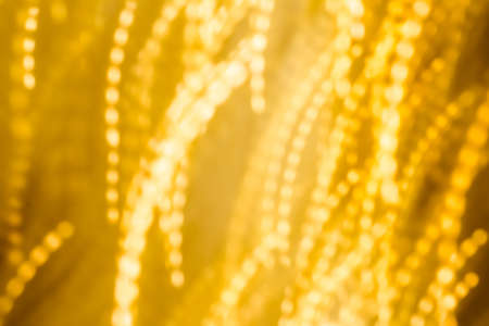 Golden Christmas lights, New Years Eve fireworks and abstract texture concept - Glamorous gold shiny glow and glitter, luxury holiday backgroundの写真素材