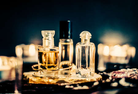 Perfumery, cosmetic branding and spa concept - Perfume bottles and vintage fragrance at night, aroma scent, fragrant cosmetics and eau de toilette as luxury beauty brand, holiday fashion parfum designの写真素材