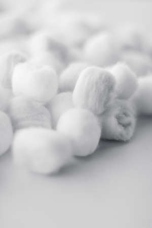 Cosmetology, branding and cleanliness concept - Organic cotton balls background for morning routine, spa cosmetics, hygiene and natural skincare beauty brand product as healthcare and medical designの写真素材