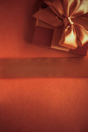 Glamour celebration, wrapped luxe boxes and shopping sale concept - Luxury gifts with golden bow as holiday background, Valentines Day presents surpriseの写真素材
