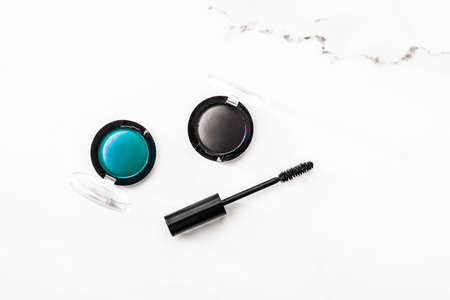 Cosmetic branding, blog and girly concept - Eyeshadows, black liner and mascara on marble background, eye shadows cosmetics as glamour make-up products for luxury beauty brand, holiday flatlay designの写真素材