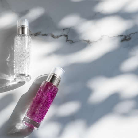 Cosmetic branding, packaging and make-up concept - Skin care serum and gel bottle, moisturizing...