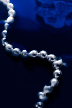 Jewelry, branding and gems concept - Coastal jewellery fashion, pearl necklace under blue water background, glamour style present and chic gift for luxury jewelery brand, holiday banner designの写真素材