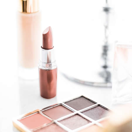 Cosmetic branding, girly and glamour concept - Cosmetics, makeup products on dressing vanity table, lipstick, foundation base, nailpolish and eyeshadows for luxury beauty and fashion brand ads designの写真素材