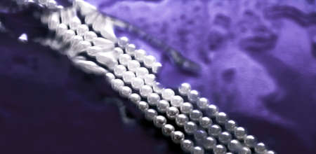 Jewelry, branding and gems concept - Coastal jewellery fashion, pearl necklace under purple water...