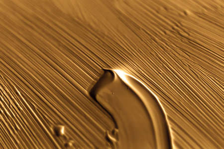 Art, branding and makeup concept - Cosmetics abstract texture background, golden acrylic paint brush stroke, textured cream product as make-up backdrop for luxury beauty brand, holiday banner designの写真素材