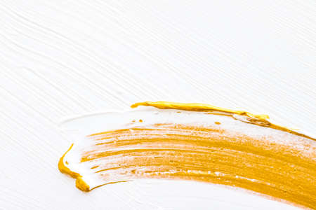 Art, branding and glamour concept - Artistic abstract texture background, golden acrylic paint brush...
