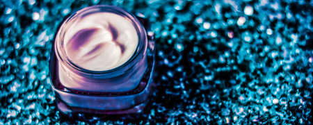 Cosmetic branding, sunscreen spf and facial care concept - Luxury face cream for healthy skin on shiny glitter sunlight background, moisturizing cosmetics and natural skincare beauty brand productの写真素材