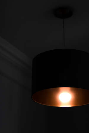 Interior design, indoor lamps and electricity concept - Bronze lamp in a room, elegant modern home decor lightingの写真素材