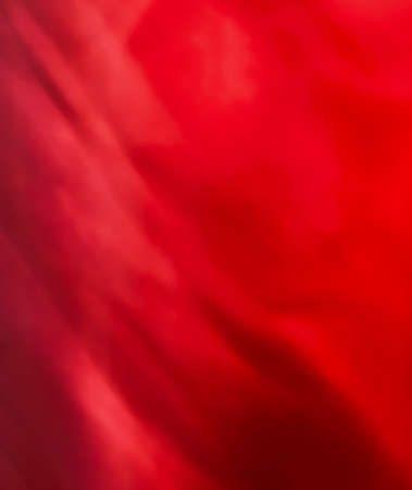 Holiday branding, beauty glamour and love backgrounds concept - Red abstract art background, silk texture and wave lines in motion for classic luxury designの写真素材