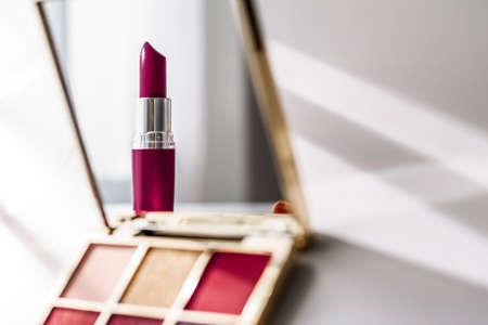 Cosmetic branding, girly and glamour concept - Cosmetics, makeup products set on marble vanity table, lipstick, eyeshadows and make-up brush for luxury beauty and fashion brand ads, holiday designの写真素材