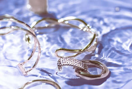 Jewellery branding, fashion gift and luxe shopping concept - Golden bracelets, earrings, rings,...