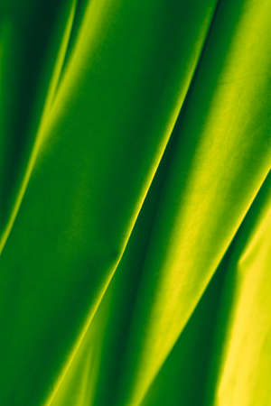 Decoration, branding and surface concept - Abstract green fabric background, velvet textile material for blinds or curtains, fashion texture and home decor backdrop for luxury interior design brandの写真素材