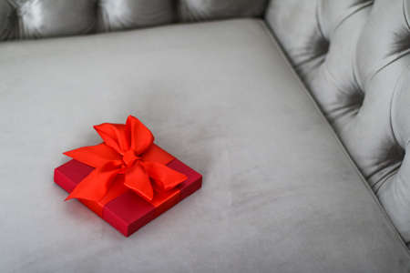 Wedding present, shop sale promotion and love celebration concept - Luxury holiday red gift box with silk ribbon and bow, christmas or valentines day decorの写真素材