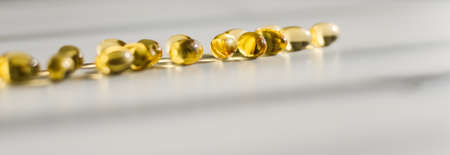 Pharmaceutical, branding and science concept -  Vitamin D and golden Omega 3 pills for healthy diet...