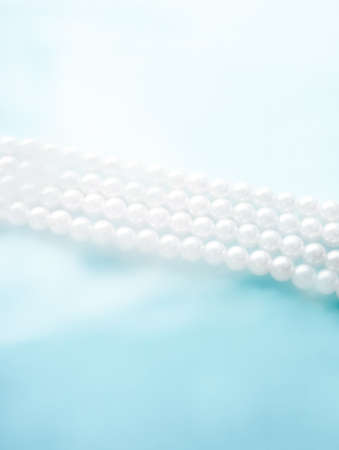 Jewelry, branding and gems concept - Coastal jewellery fashion, pearl necklace under blue water background, glamour style present and chic gift for luxury jewelery brand, holiday banner designの写真素材