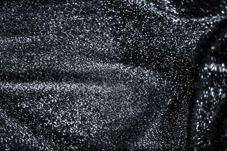 Luxe glowing texture, night club branding and New Years party concept - Silver holiday sparkling glitter abstract background, luxury shiny fabric material for glamour design and festive invitationの写真素材