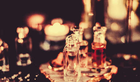 Perfumery, cosmetic branding and spa concept - Perfume bottles and vintage fragrance at night, aroma scent, fragrant cosmetics and eau de toilette as luxury beauty brand, holiday fashion parfum designの写真素材