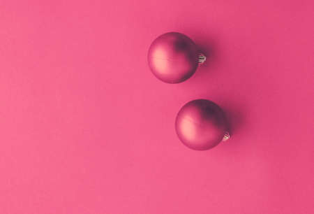 Gift decor, New Years Eve and happy celebration concept - Christmas baubles on pink flatlay backdrop, luxury winter holiday card backgroundの写真素材