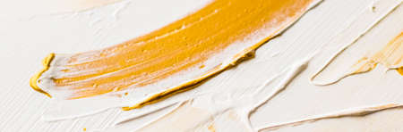 Art, branding and glamour concept - Artistic abstract texture background, golden acrylic paint brush...
