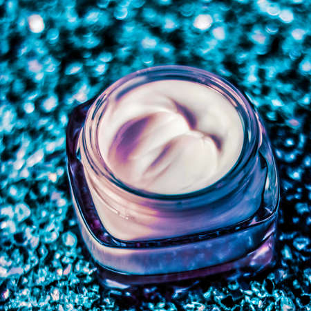 Cosmetic branding, sunscreen spf and facial care concept - Luxury face cream for healthy skin on shiny glitter sunlight background, moisturizing cosmetics and natural skincare beauty brand productの写真素材