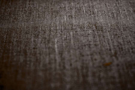 Textile material, natural surface and vintage decor texture concept - Decorative dark linen fabric textured background for interior, furniture design and art canvas backdropの写真素材