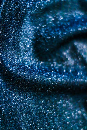 Luxe glowing texture, night club branding and New Years party concept - Blue holiday sparkling glitter abstract background, luxury shiny fabric material for glamour design and festive invitationの写真素材