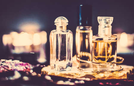 Perfumery, cosmetic branding and spa concept - Perfume bottles and vintage fragrance at night, aroma scent, fragrant cosmetics and eau de toilette as luxury beauty brand, holiday fashion parfum designの写真素材