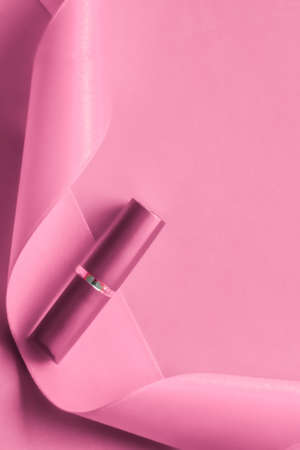 Cosmetic branding, glamour lip gloss and shopping sale concept - Luxury lipstick and silk ribbon on...