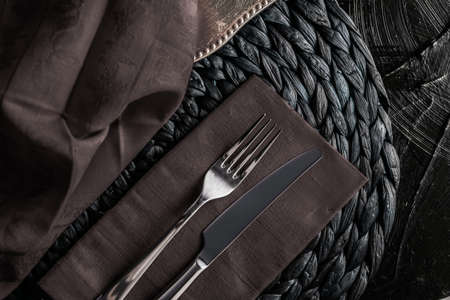 Table scape, menu and interior concept - Holiday table setting with brown napkin and silver cutlery, food styling props, vintage set for wedding, event, date, party or luxury home decor brand designの写真素材