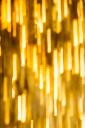 Golden Christmas lights, New Years Eve fireworks and abstract texture concept - Glamorous gold shiny glow and glitter, luxury holiday backgroundの写真素材