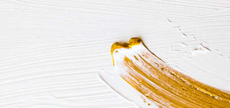 Art, branding and glamour concept - Artistic abstract texture background, golden acrylic paint brush stroke, textured ink oil splash as print backdrop for luxury holiday brand, flatlay banner designの写真素材