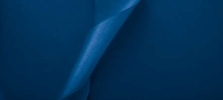 Branding, holidays and luxe brands concept - Abstract silk ribbon on royal blue background, exclusive luxury brand design for holiday sale product promotion and glamour art invitation card backdropの写真素材