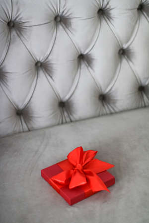 Wedding present, shop sale promotion and love celebration concept - Luxury holiday red gift box with silk ribbon and bow, christmas or valentines day decorの写真素材