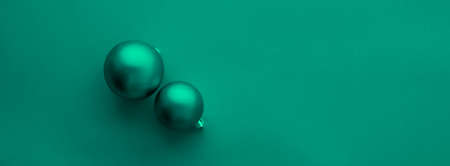 Gift decor, New Years Eve and happy celebration concept - Christmas baubles on green flatlay backdrop, luxury winter holiday card backgroundの写真素材