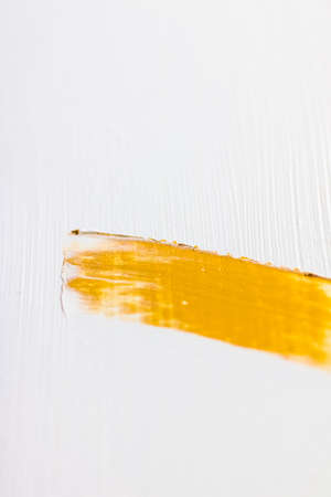 Art, branding and glamour concept - Artistic abstract texture background, golden acrylic paint brush stroke, textured ink oil splash as print backdrop for luxury holiday brand, flatlay banner designの写真素材