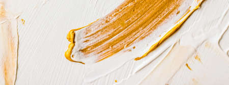 Art, branding and glamour concept - Artistic abstract texture background, golden acrylic paint brush stroke, textured ink oil splash as print backdrop for luxury holiday brand, flatlay banner designの写真素材