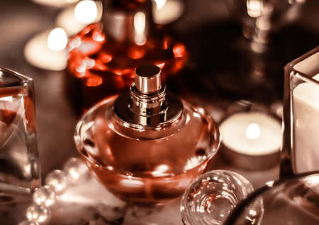 Perfumery, cosmetics branding and luxe concept - Perfume bottle and vintage fragrance on glamour...