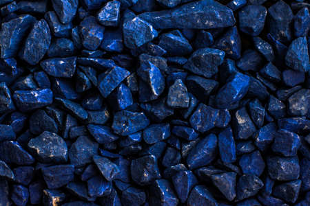 Decor, surface and nature concept - Dark blue stone pebbles as abstract background texture, landscape architecture backdrop, interior design and textured pattern for luxury brand designの写真素材