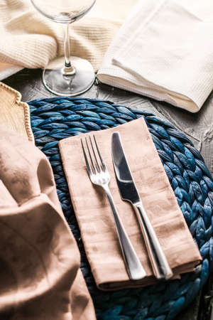 Table scape, menu and interior concept - Holiday table setting with beige napkin and silver cutlery, food styling props, vintage set for wedding, event, date, party or luxury home decor brand designの写真素材
