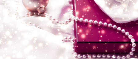 Holidays branding, glamour and decoration concept - Christmas magic holiday background, festive baubles, maroon vintage gift box and golden glitter as winter season present for luxury brand designの写真素材