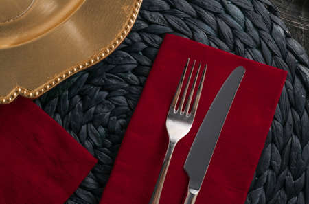 Table scape, menu and interior concept - Holiday table setting with red napkin and silver cutlery, food styling props, vintage set for wedding, event, date, party or luxury home decor brand designの写真素材