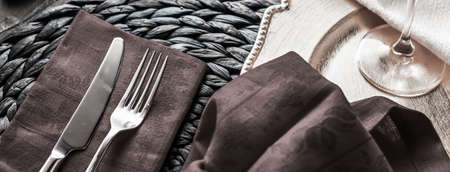 Table scape, menu and interior concept - Holiday table setting with brown napkin and silver cutlery, food styling props, vintage set for wedding, event, date, party or luxury home decor brand designの写真素材