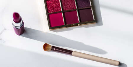 Cosmetic branding, girly and glamour concept - Cosmetics, makeup products set on marble vanity table, lipstick, eyeshadows and make-up brush for luxury beauty and fashion brand ads, holiday designの写真素材