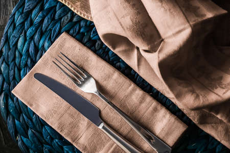 Table scape, menu and interior concept - Holiday table setting with beige napkin and silver cutlery, food styling props, vintage set for wedding, event, date, party or luxury home decor brand designの写真素材